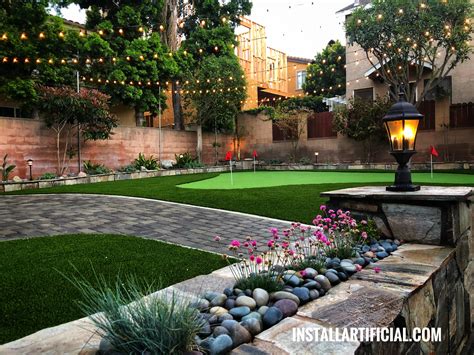 backyard landscape design with artificial grass